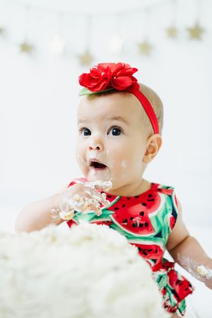 Studio cake smash photographer in Centennial Colorado. Colorado cake smash photo shoot in studio. Baby's First year cake smash photo session