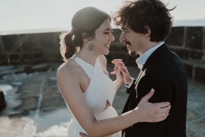 Dreamy elopement portrait in Porto by the seaCouple standing still in silence – poetic wedding photo in Portugal