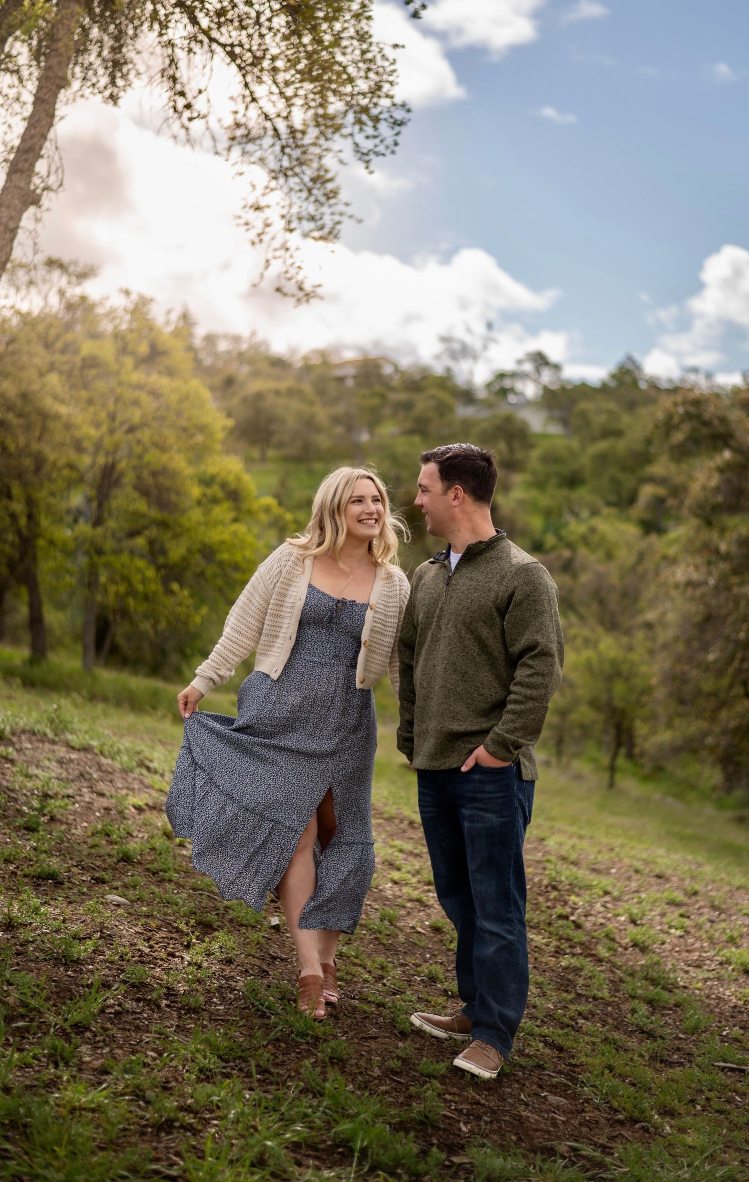 A couple walking together in the vibrant colors of spring