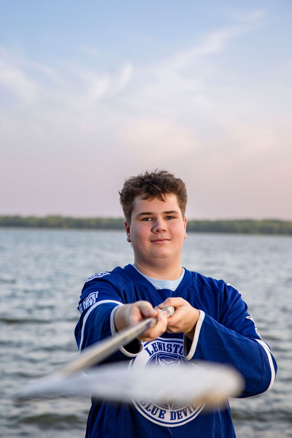 Senior portrait of a high school athlete in central, Maine.