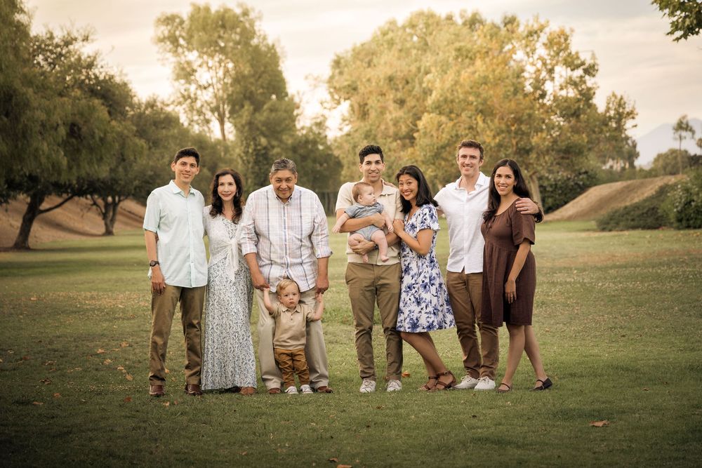 a family portrait taken at golden hour in Laguna Beach, CA