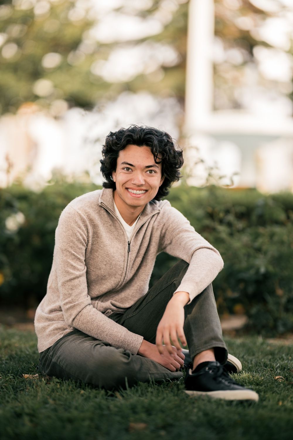 Logan Kishi, a director and actor, poses for headshots in the orange circle, CA