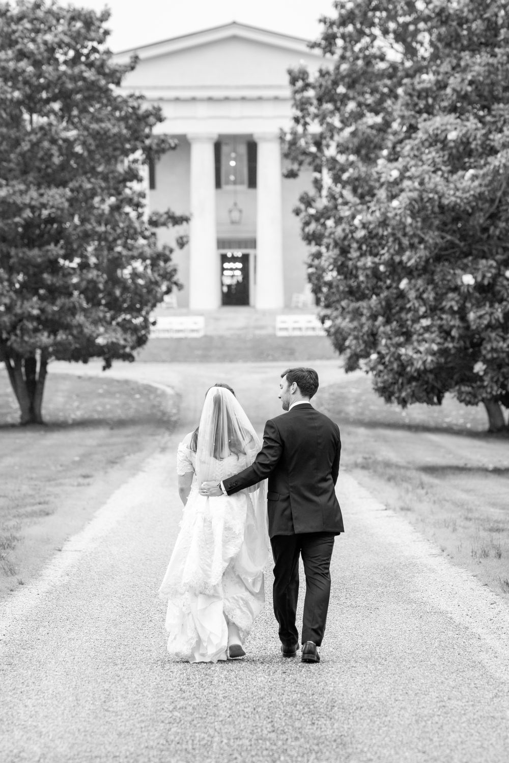 Bride and groom sharing an intimate moment after their wedding ceremony.