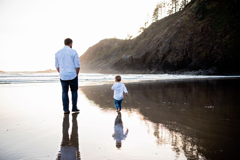 Father and son walking at Ecola State Park