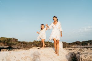 mother and her daugther walking together
