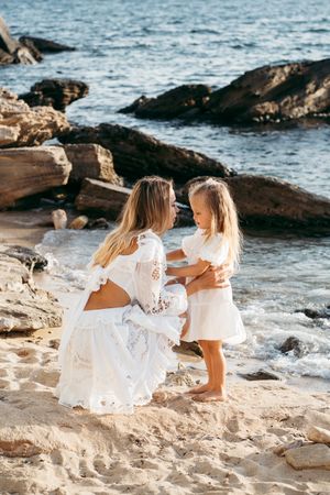 mother and daughter on the beach