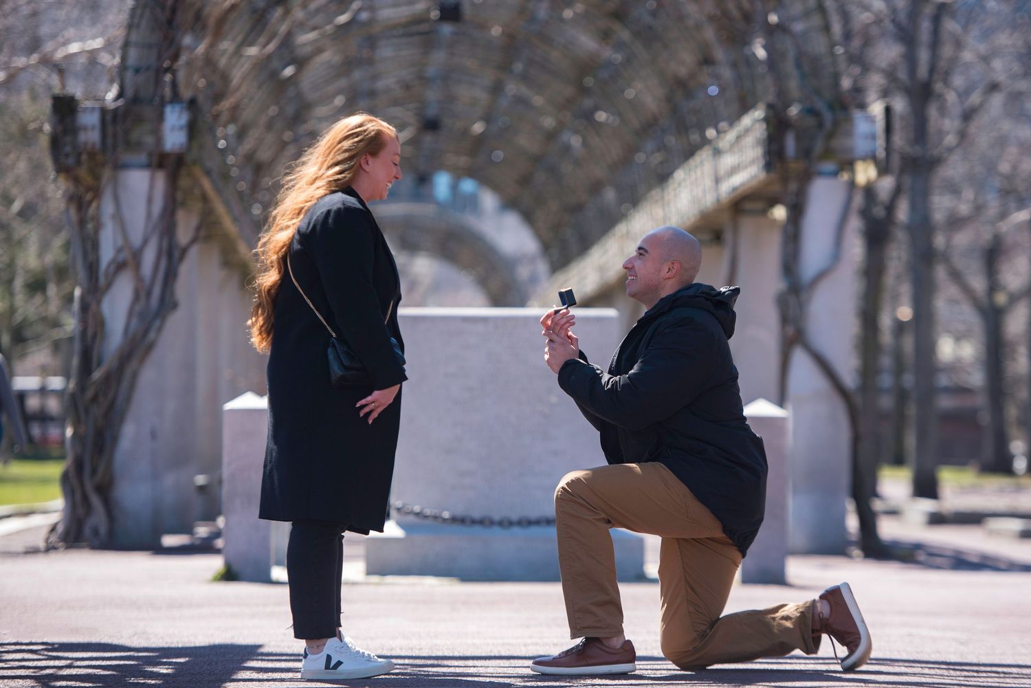 Marriage proposal under the trellis at Christopher Columbus Park in Boston’s Historic North End with Leah Ramuglia Photography.
