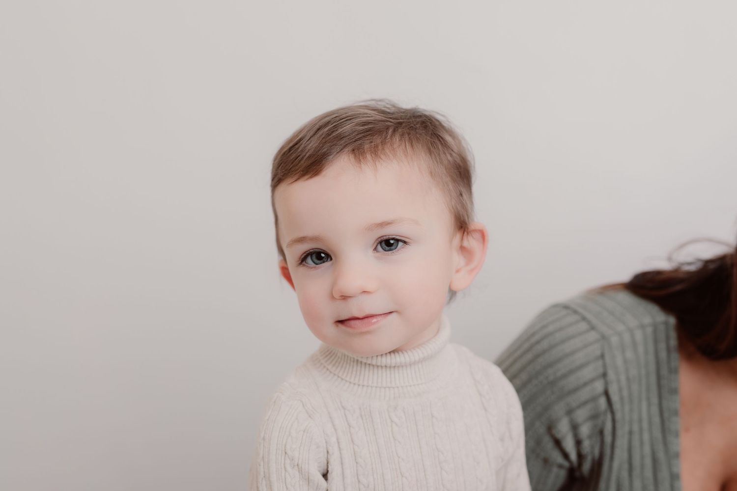 Candid family moment captured during professional studio photoshoot. Photographer. Hull. East Yorkshire. Photography