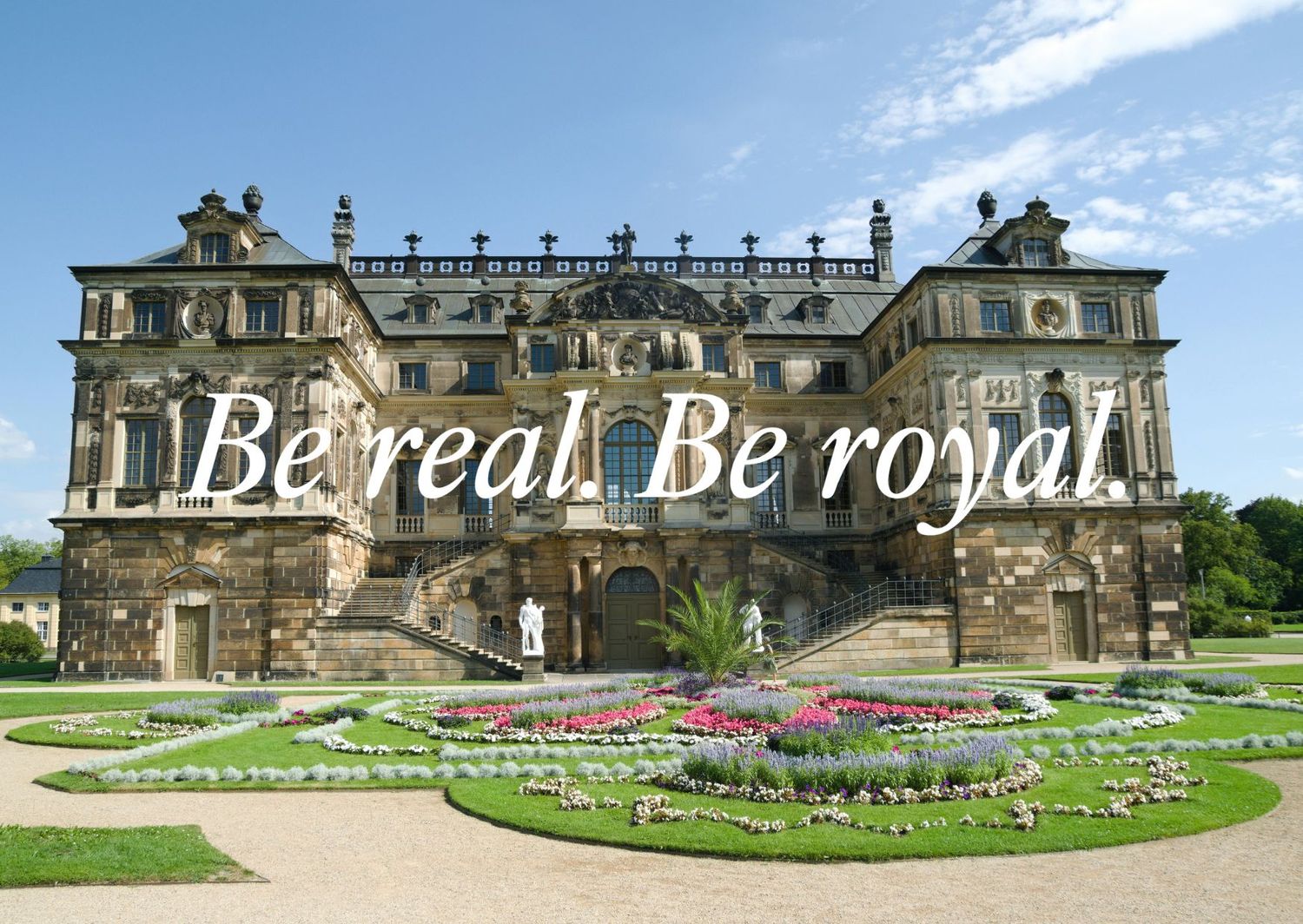 Majestic palace with immaculate gardens featuring 'Be real. Be royal' text overlay.