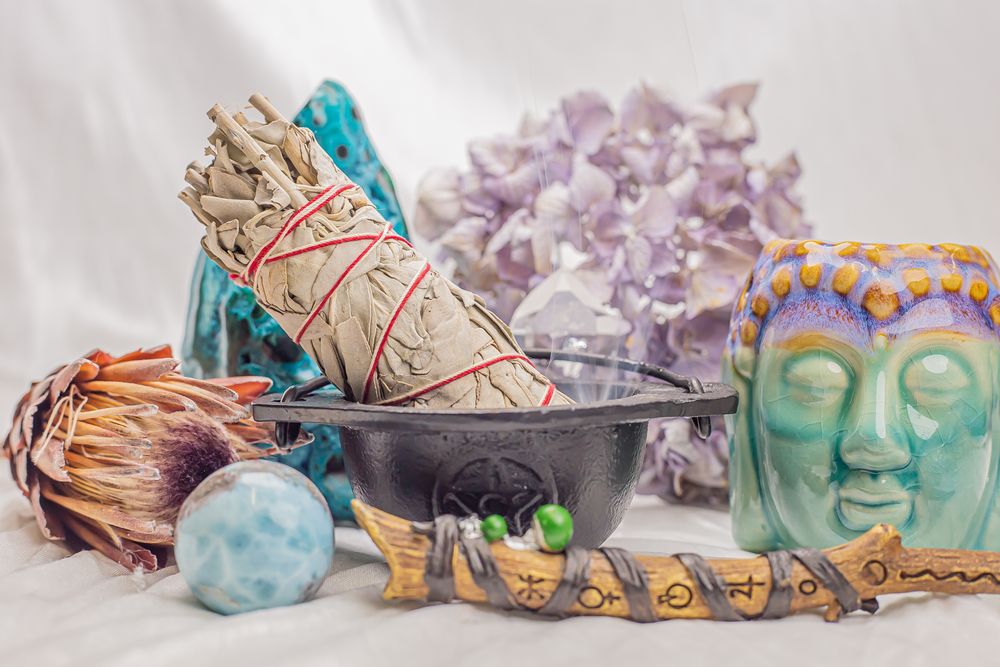 A row of colorful ceramic animal figurines displayed in a line on a light surface.