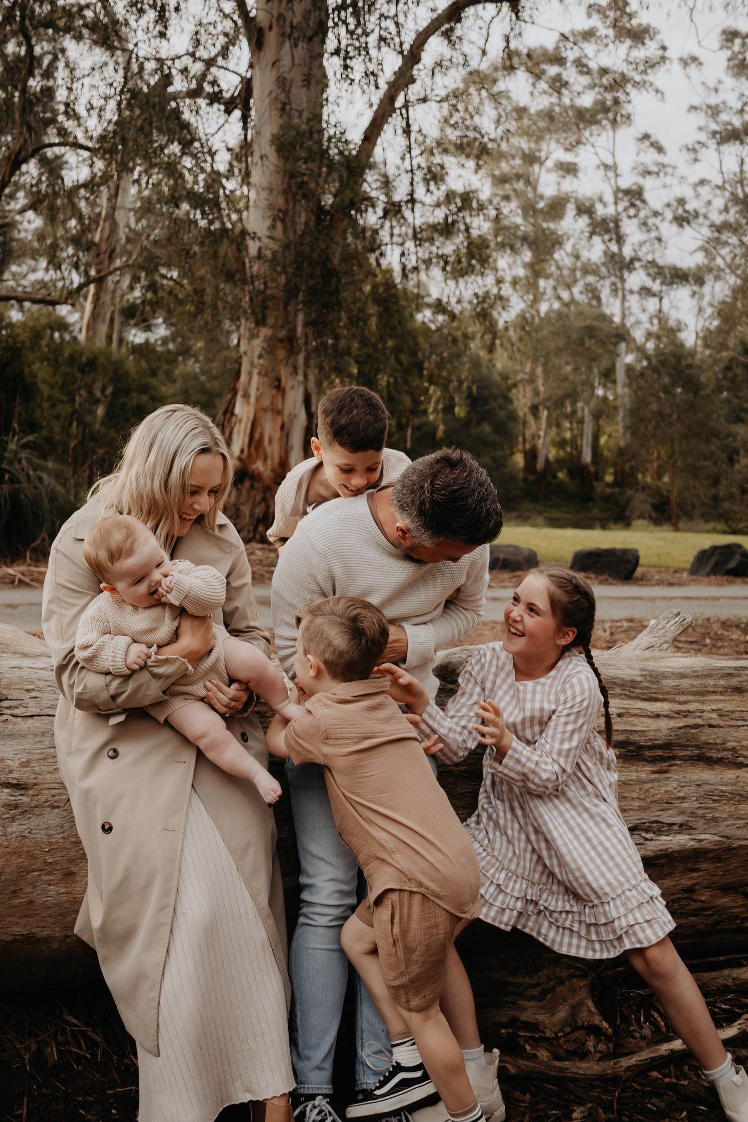 Family tickling each other.