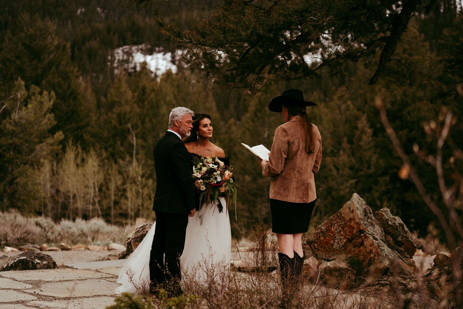 Elegant outdoor wedding ceremony at upscale mountain resort