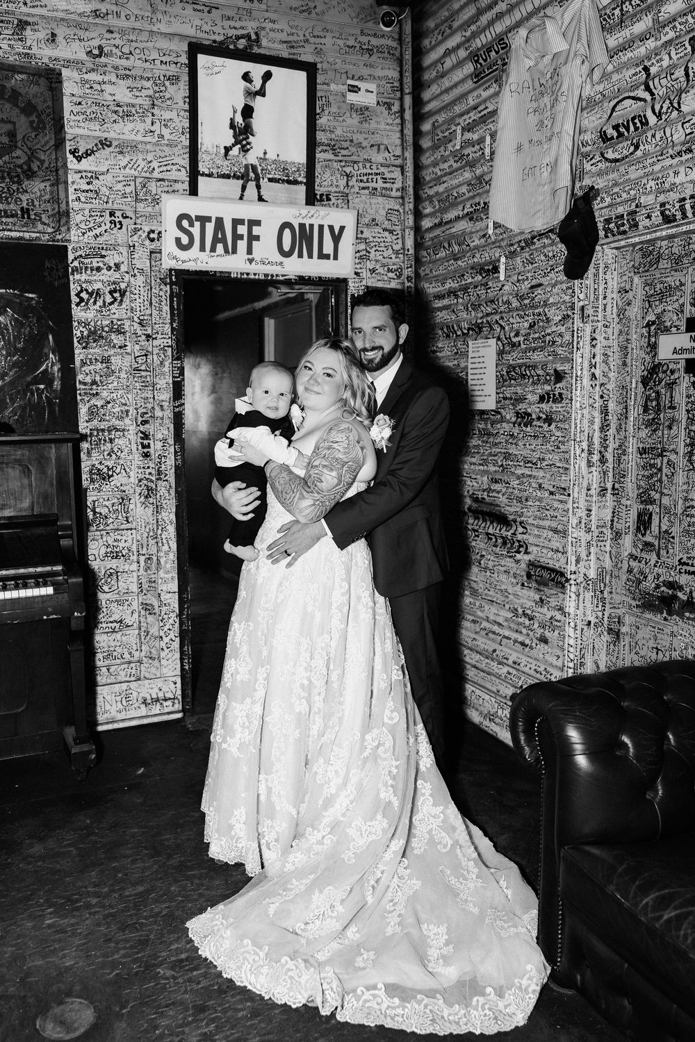 A series of black and white photos showing a couple dancing in an old room with graffiti-covered walls.