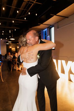 Sequence of dance photos showing a romantic first dance at a wedding reception with glowing white letters in background.