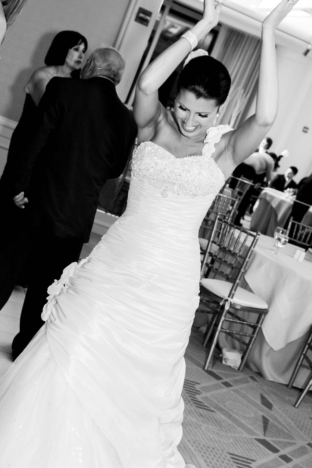 A collage showing different angles of a strapless white wedding dress with beaded details and ruched bodice.