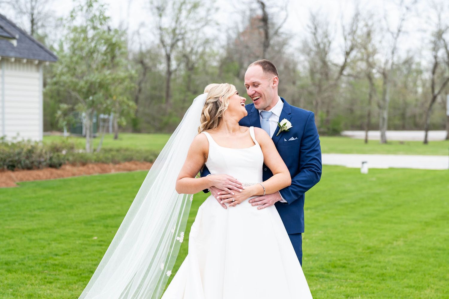 bride and groom laugh