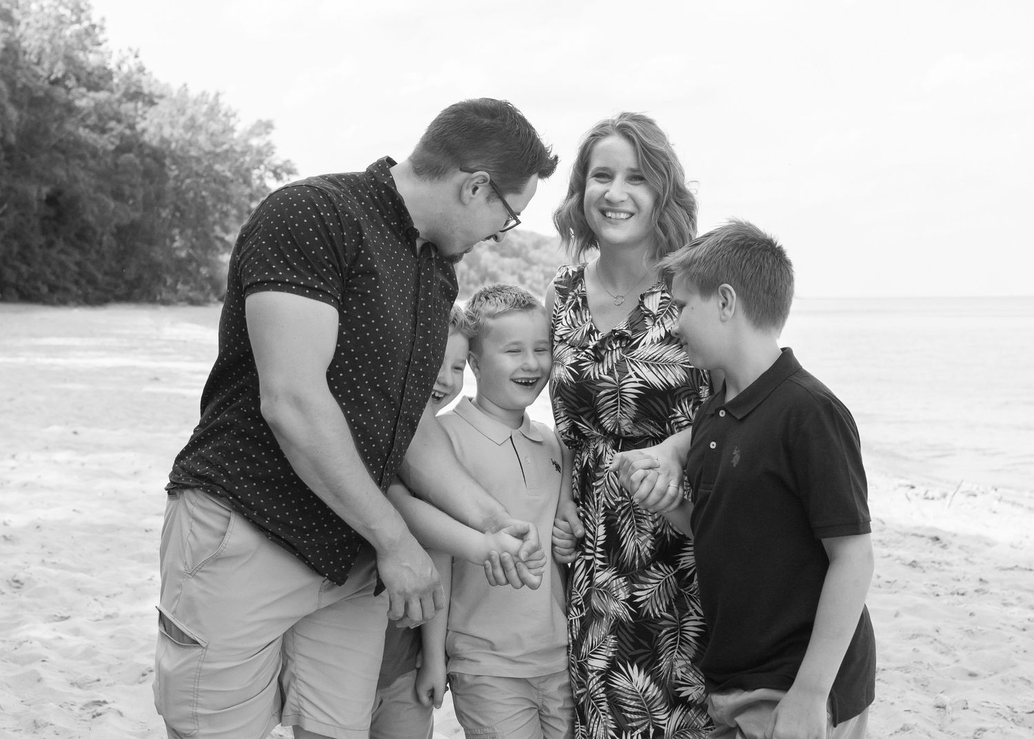 Family portrait session in Milwaukee capturing genuine moments of love, laughter, and connection with natural light & timeless composition