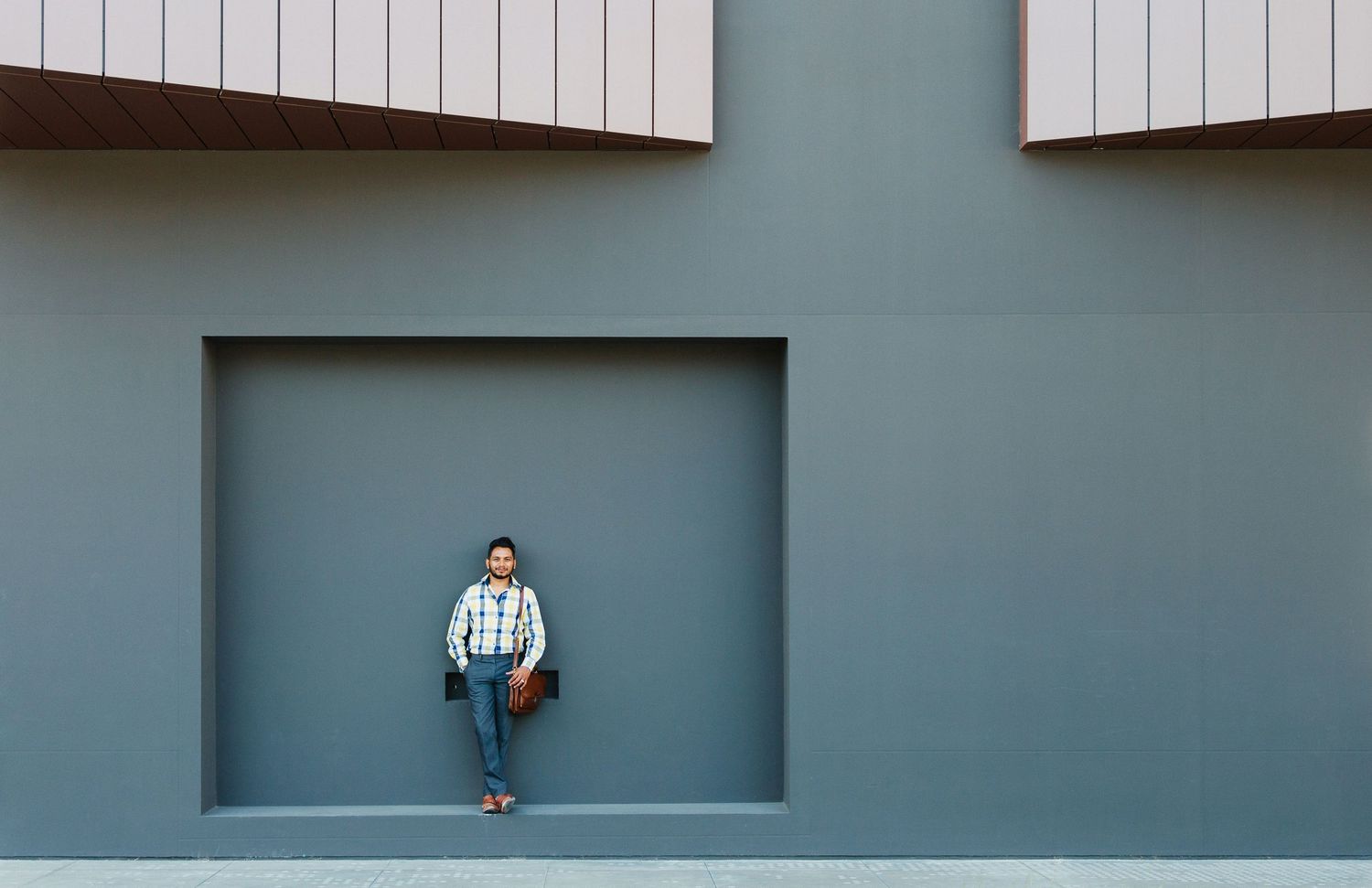 Architect personal branding portrait with geometric architecture