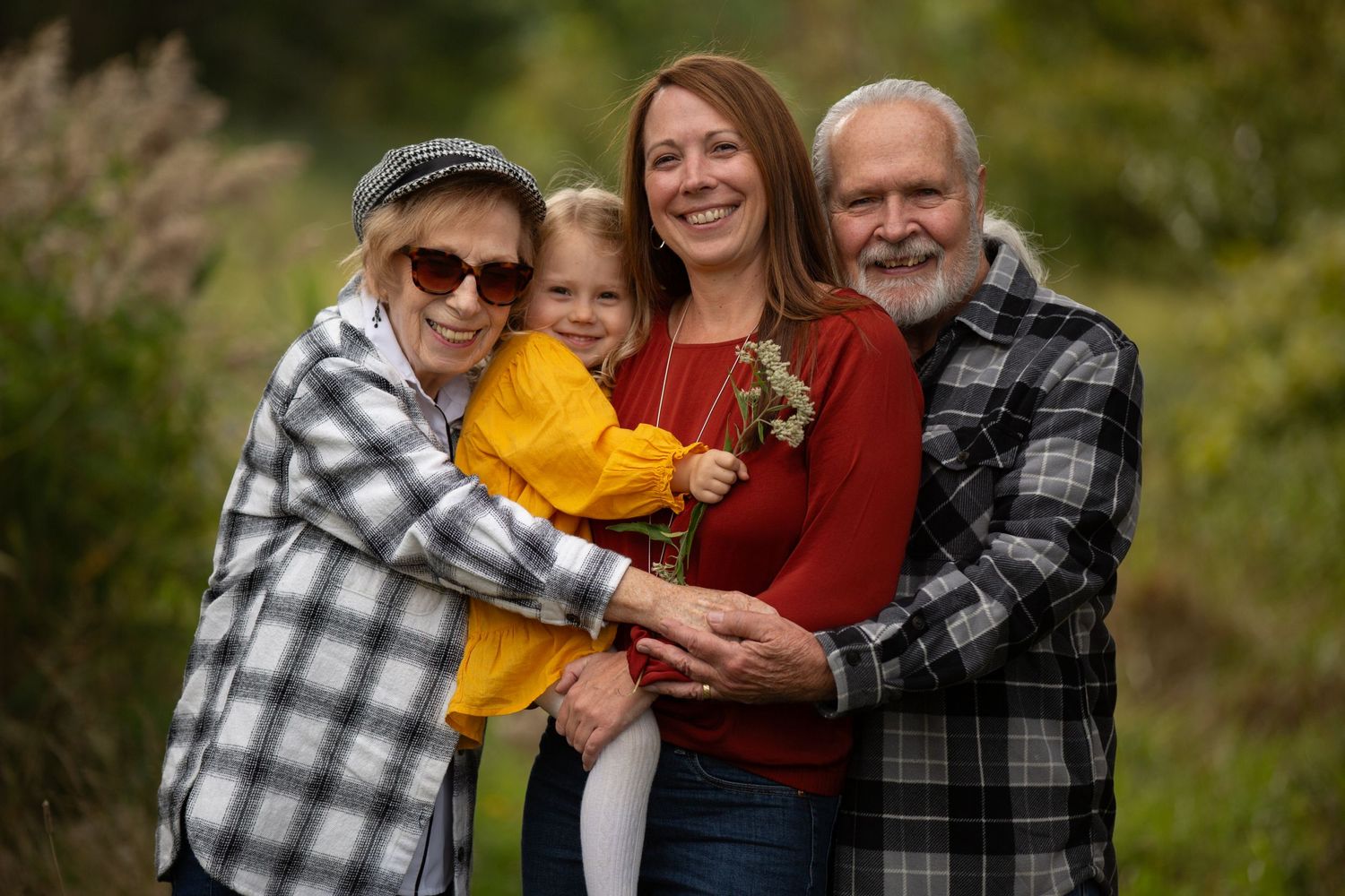 Family portrait session in autumn with casual outfits and natural poses.