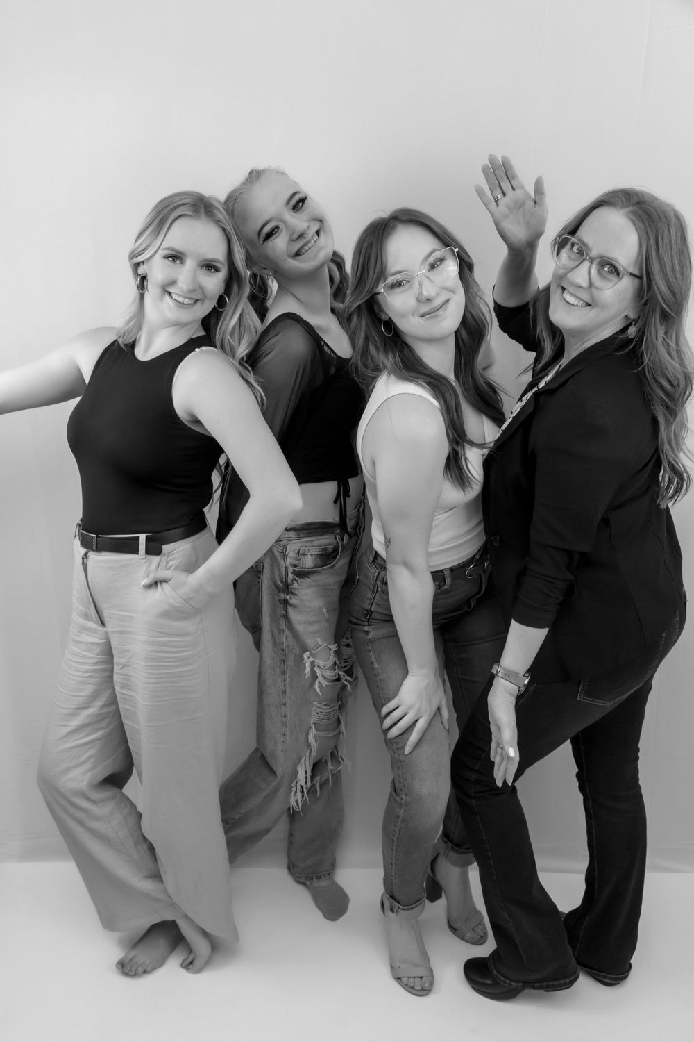 Black and white image of four women business owners Boise wedding photographer
