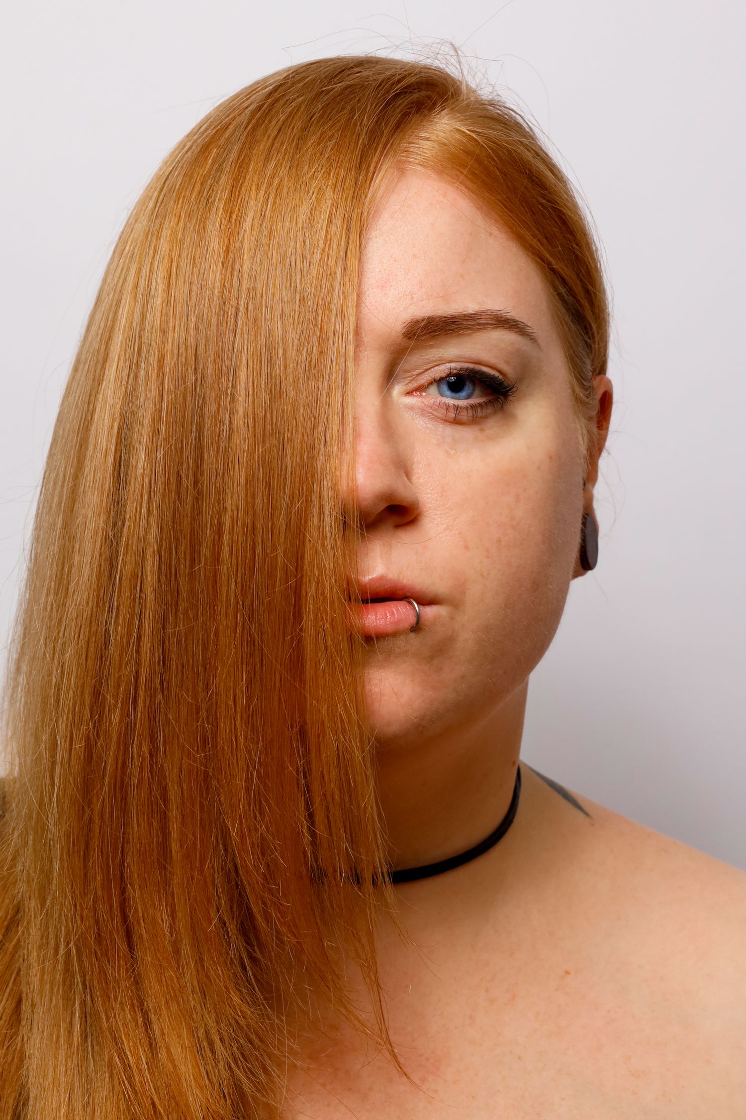 A creative portrait of a red headed white woman with blue eyes. Riverton, Clare Valley, Adelaide, South Australia