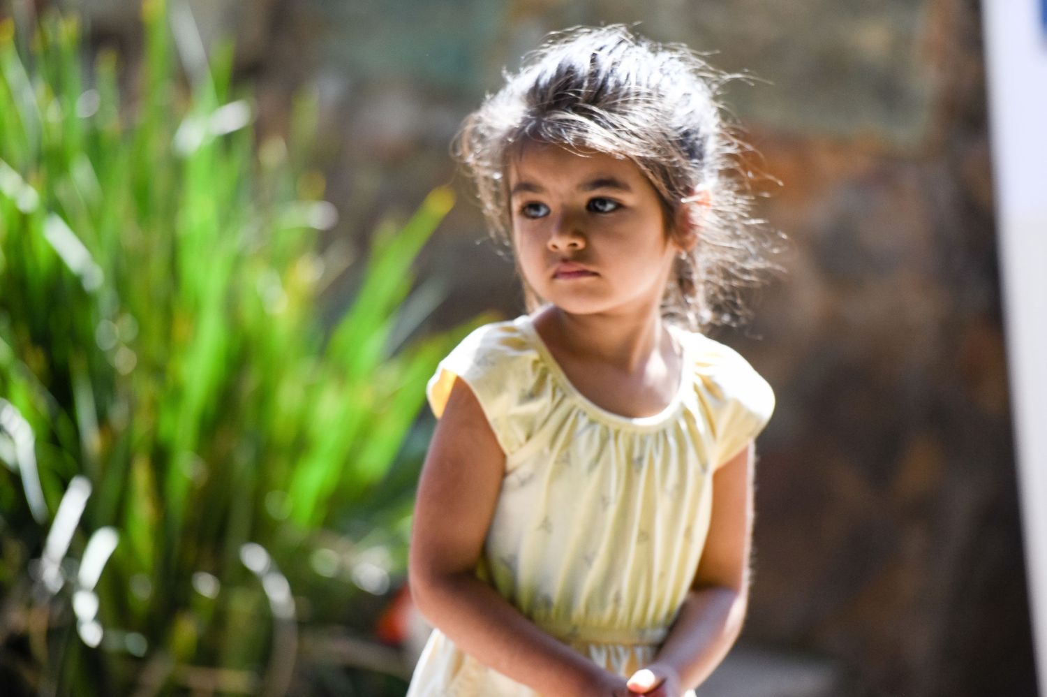 Candid shot of pensive girl at The Bridge Nursery School