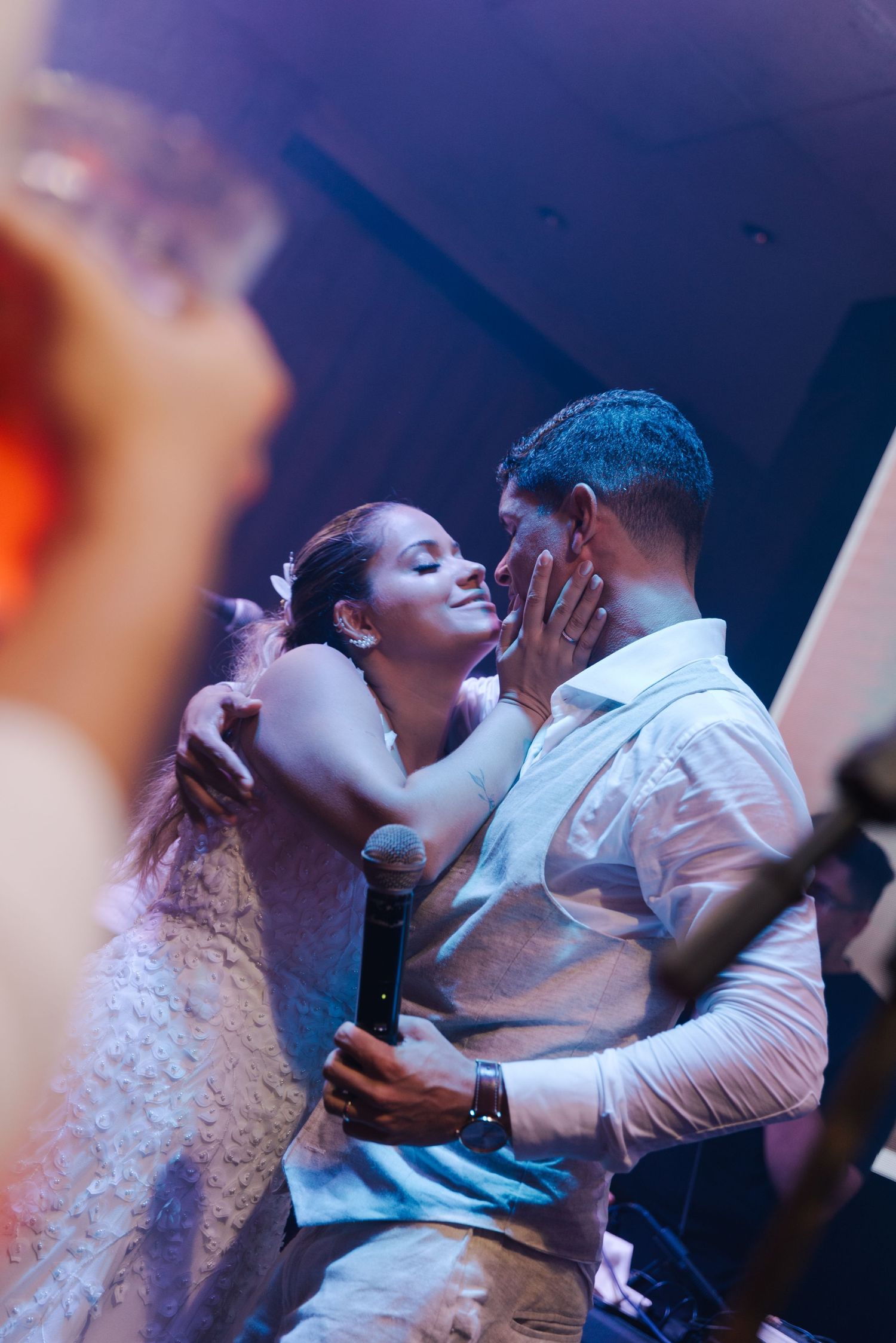 A romantic moment captured between newlyweds during their first dance.