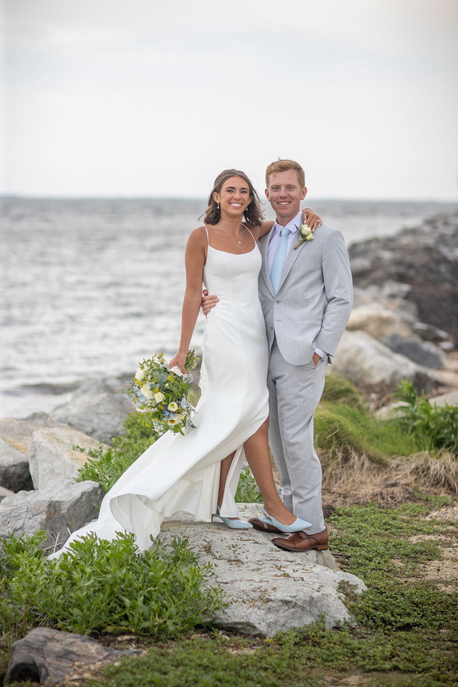 Bride and groom waterfront portrait at Land's End in Sayville, New York, overlooking the Great South Bay.