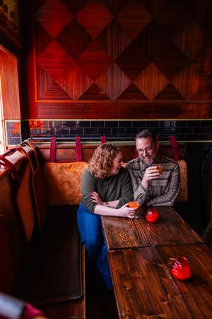Salt Lake City Utah Photographer, candid relaxed couple on a date night at a bar downtown