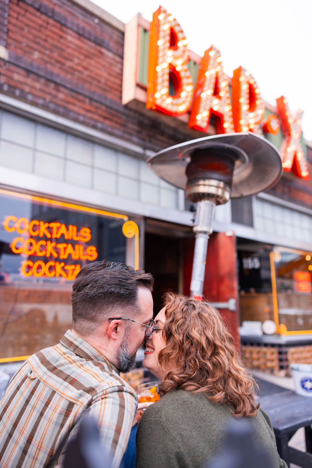 Salt Lake City Utah Photographer, candid relaxed couple on a date night at a bar downtown