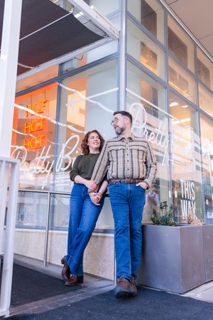 Salt Lake City Utah Photographer, candid relaxed couple on a date night at a diner with burgers and fries downtown