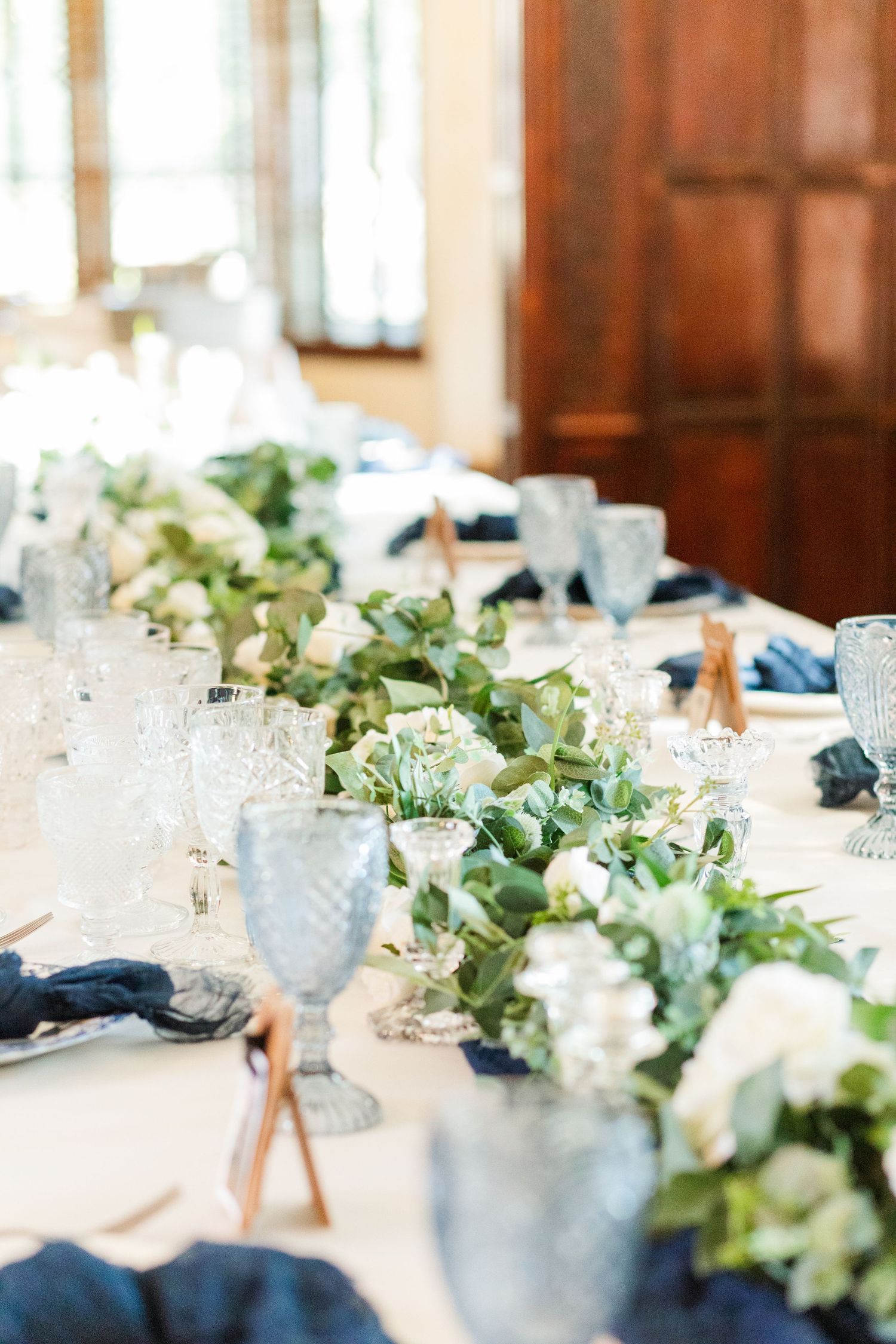 A wedding reception table decorated for a fall wedding at the Virginia House in Richmond, VA.