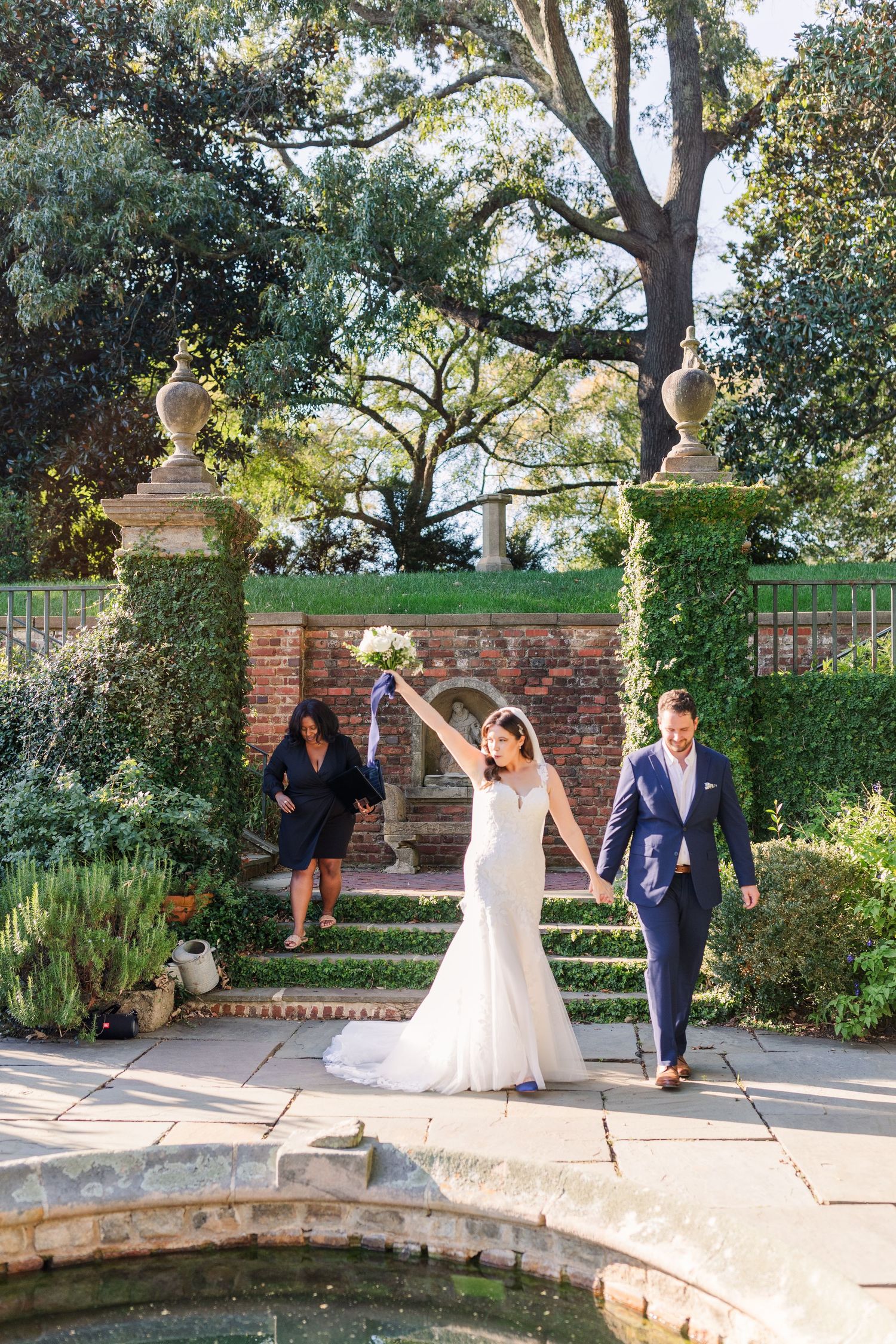 A bride and groom celebrate after their wedding ceremony at the Virginia House in Richmond, VA.