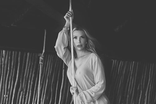 Elegant and sensual boudoir photoshoot in the hotel room at Azulik Tulum.