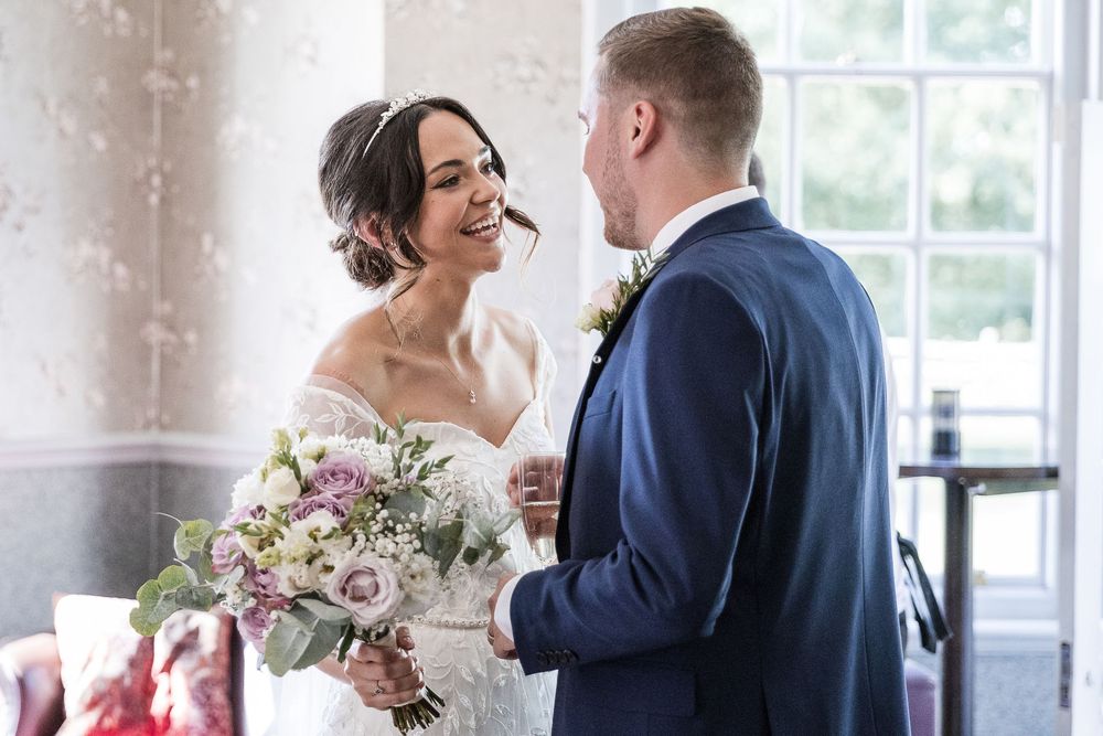 Wedding couple shares an intimate moment at Kelham House.