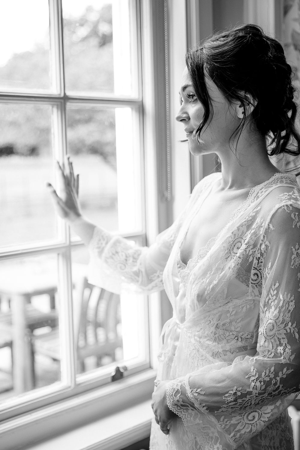 Bride getting ready in the bridal suite at Kelham House.