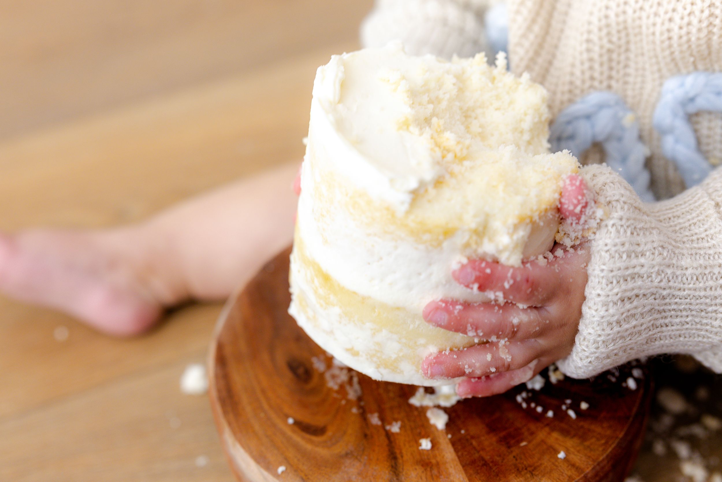 A close-up sequence showing whipped cream being piped onto a dessert in multiple steps.