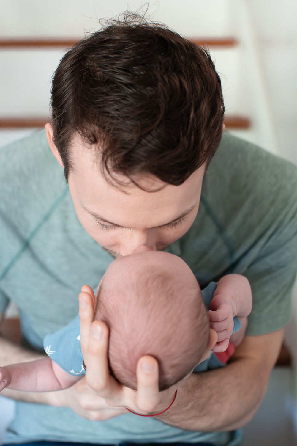 Winston-Salem dad cherishes his newborn baby.