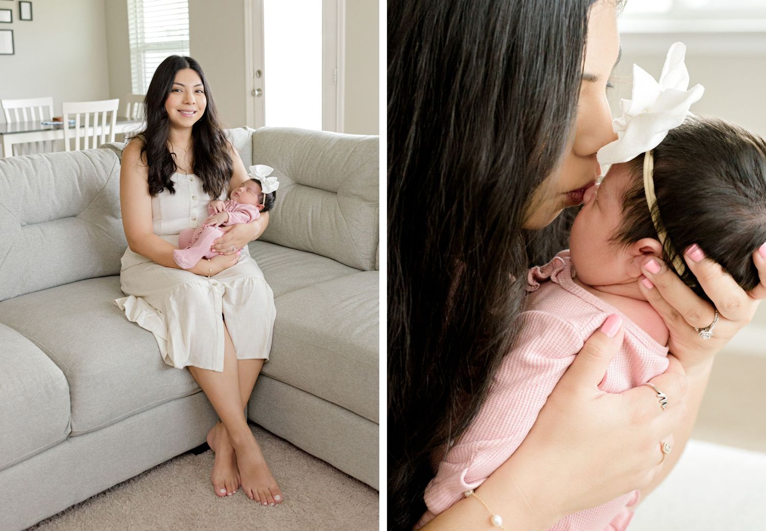 A tender family moment captured in soft lighting shows a baby being cradled on a gray couch in a bright living room.