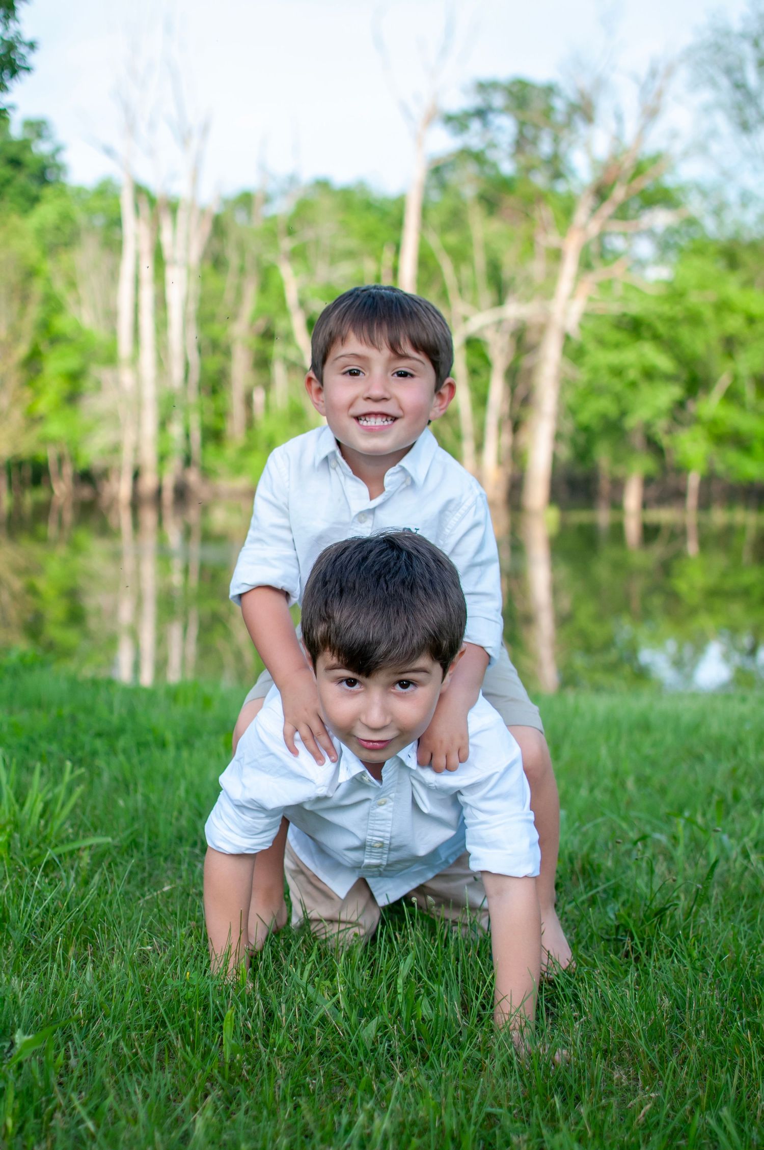 Brothers giving piggy back ride photo