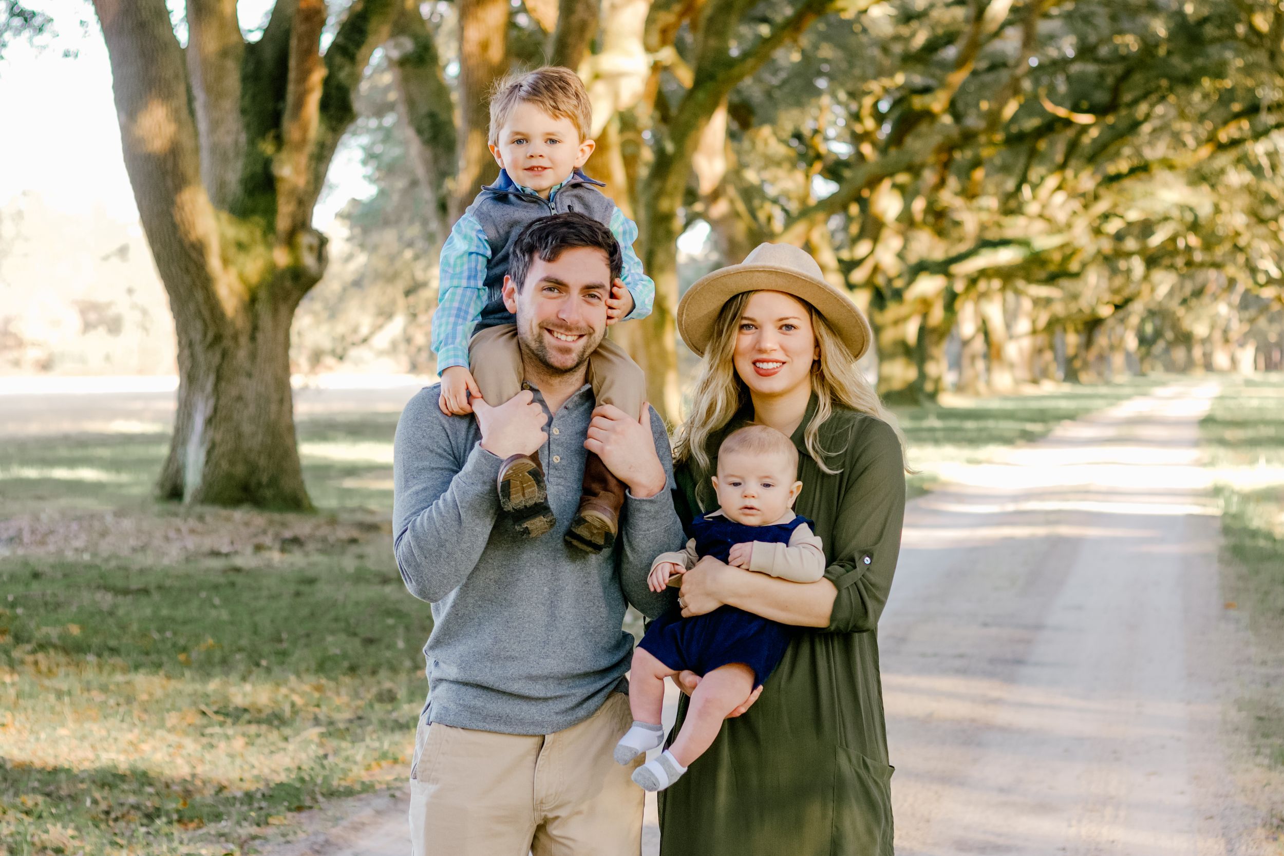 Family enjoying an autumn day under Spanish moss draped oak trees.