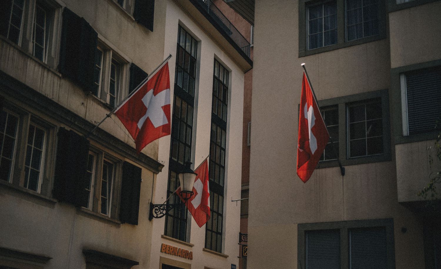 Fine art landscape photograph of flags in Zurich, Switzerland, EyeofBlaxz international photography - captured by Blaxz Alexander