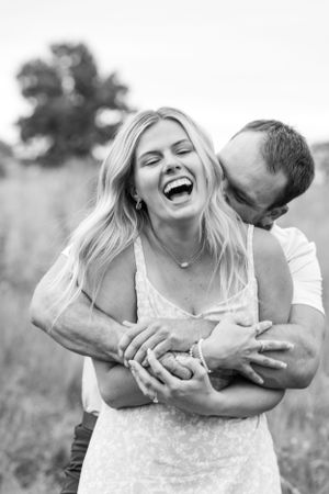 Engaged couple in a park
