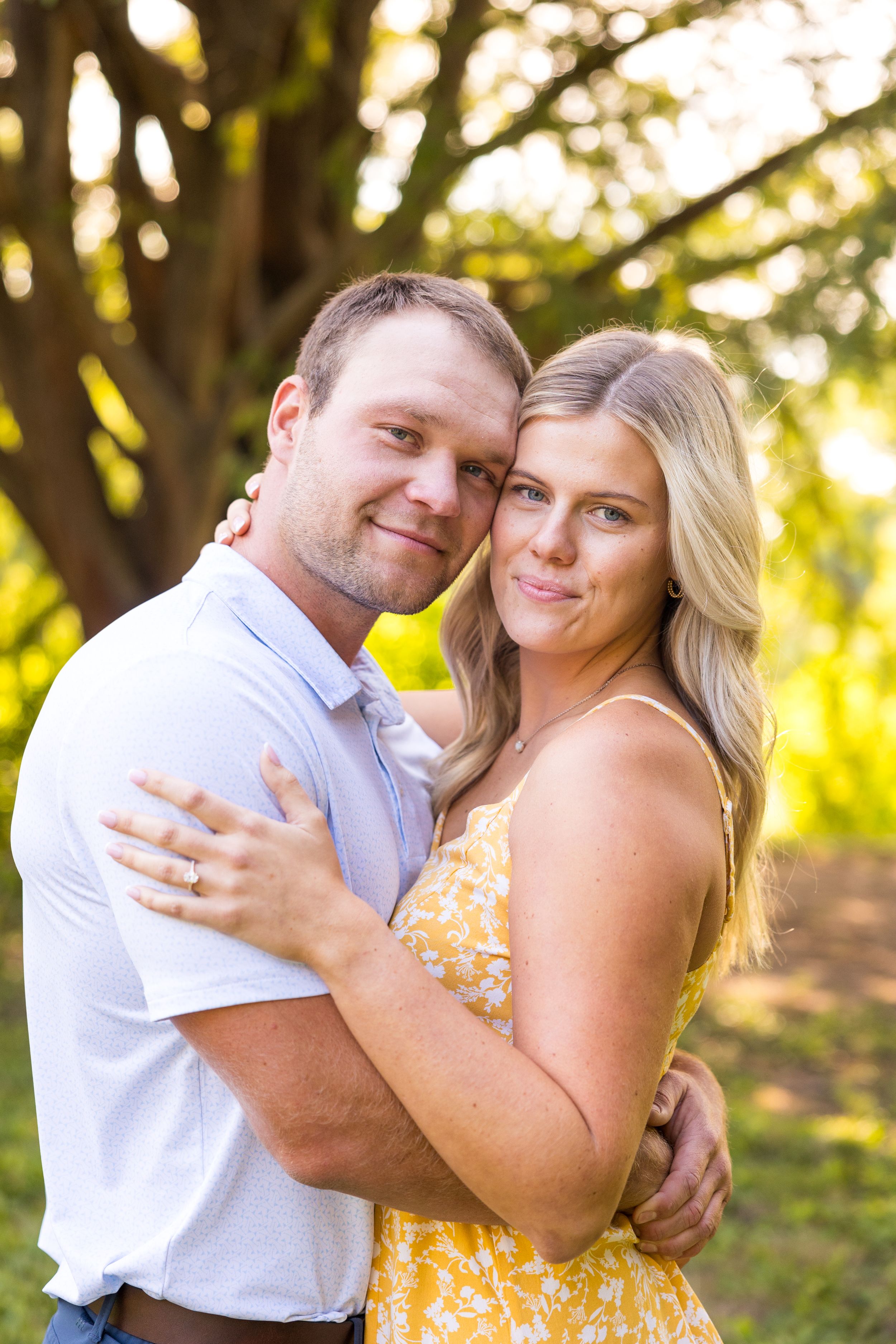 Engaged couple in a park