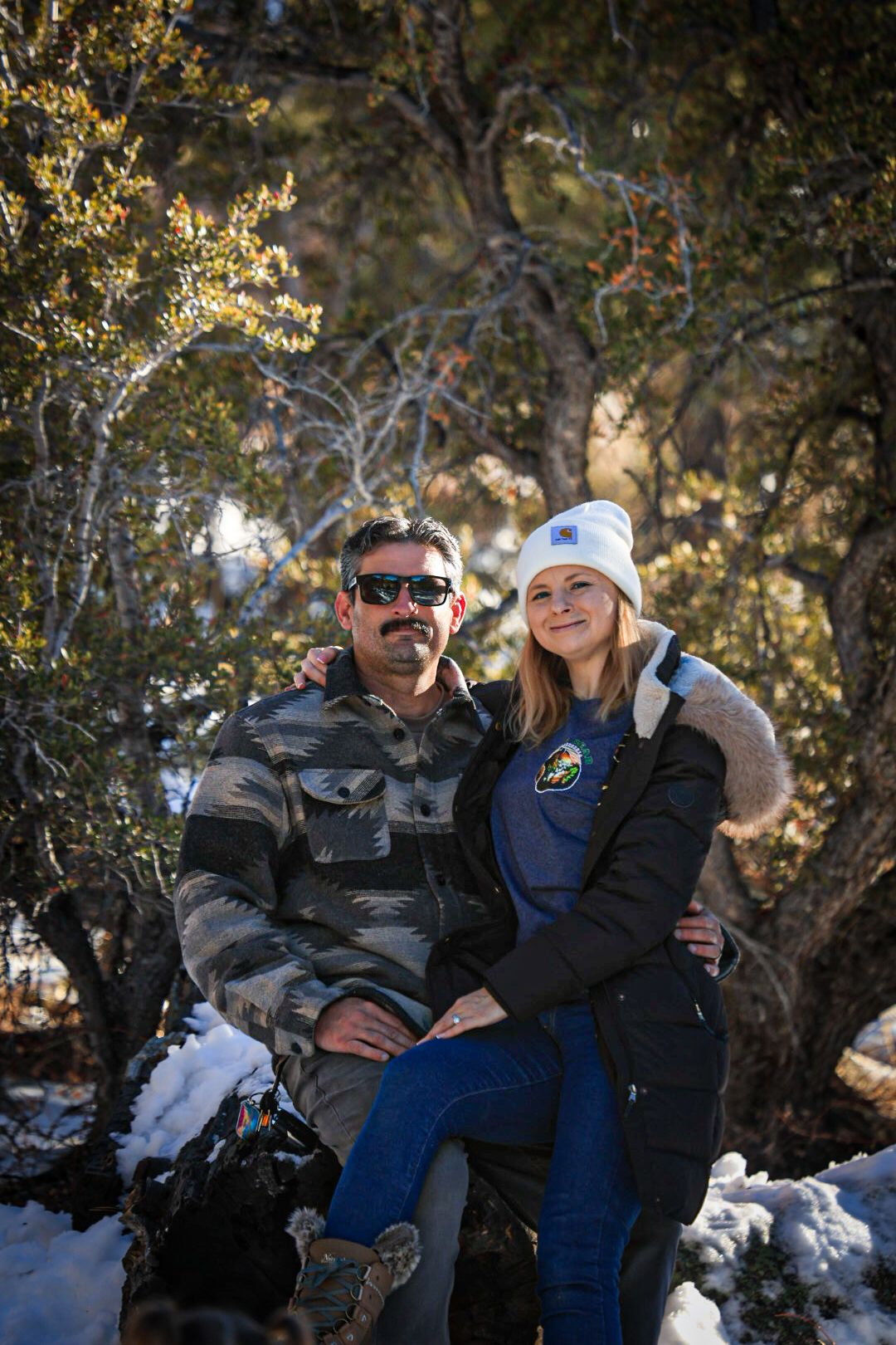 Winter family photoshoot series in a snowy forest setting with natural lighting.