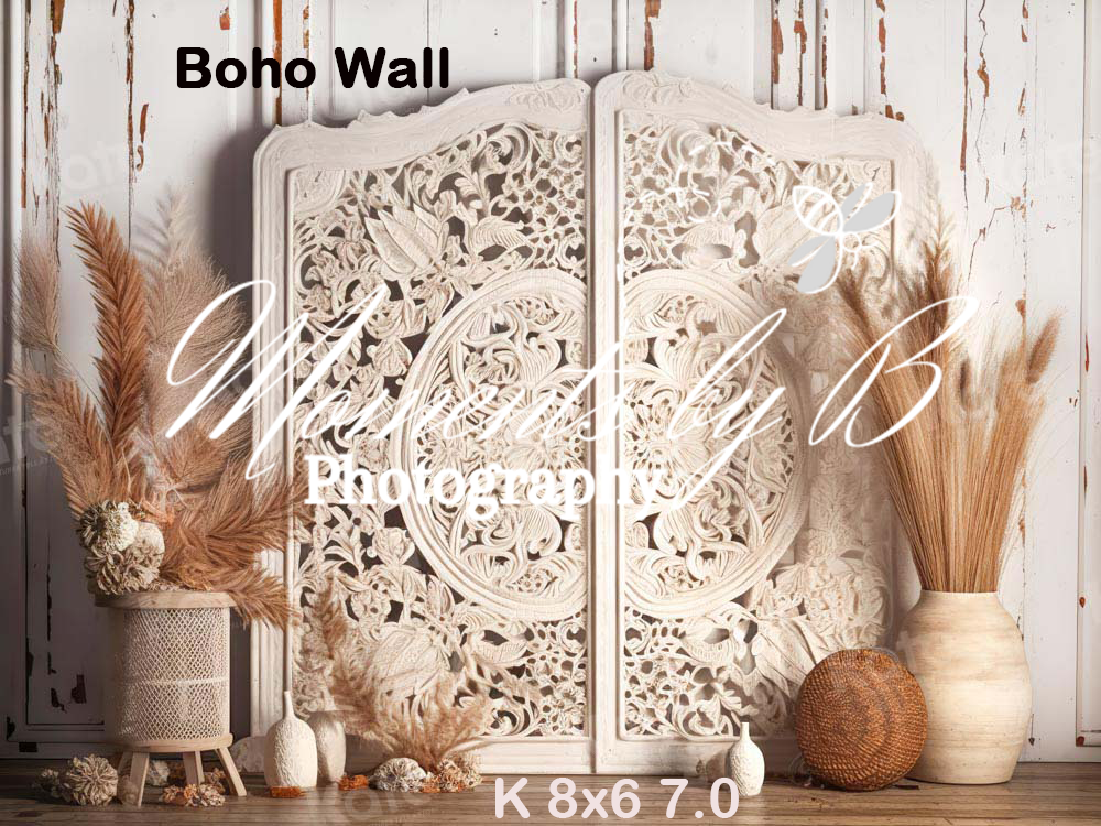 White ornate carved wooden wall panel with boho decor elements including pampas grass and neutral toned vases.