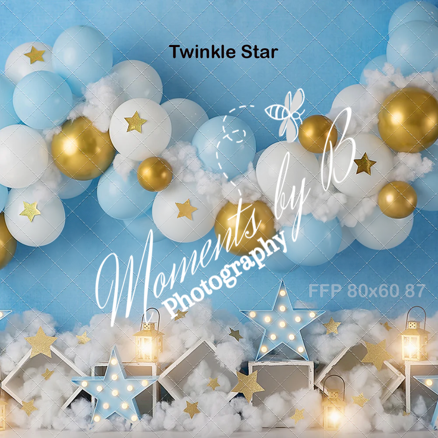 Dreamy balloon backdrop with gold and blue balloons, star lights, and twinkle decorations.