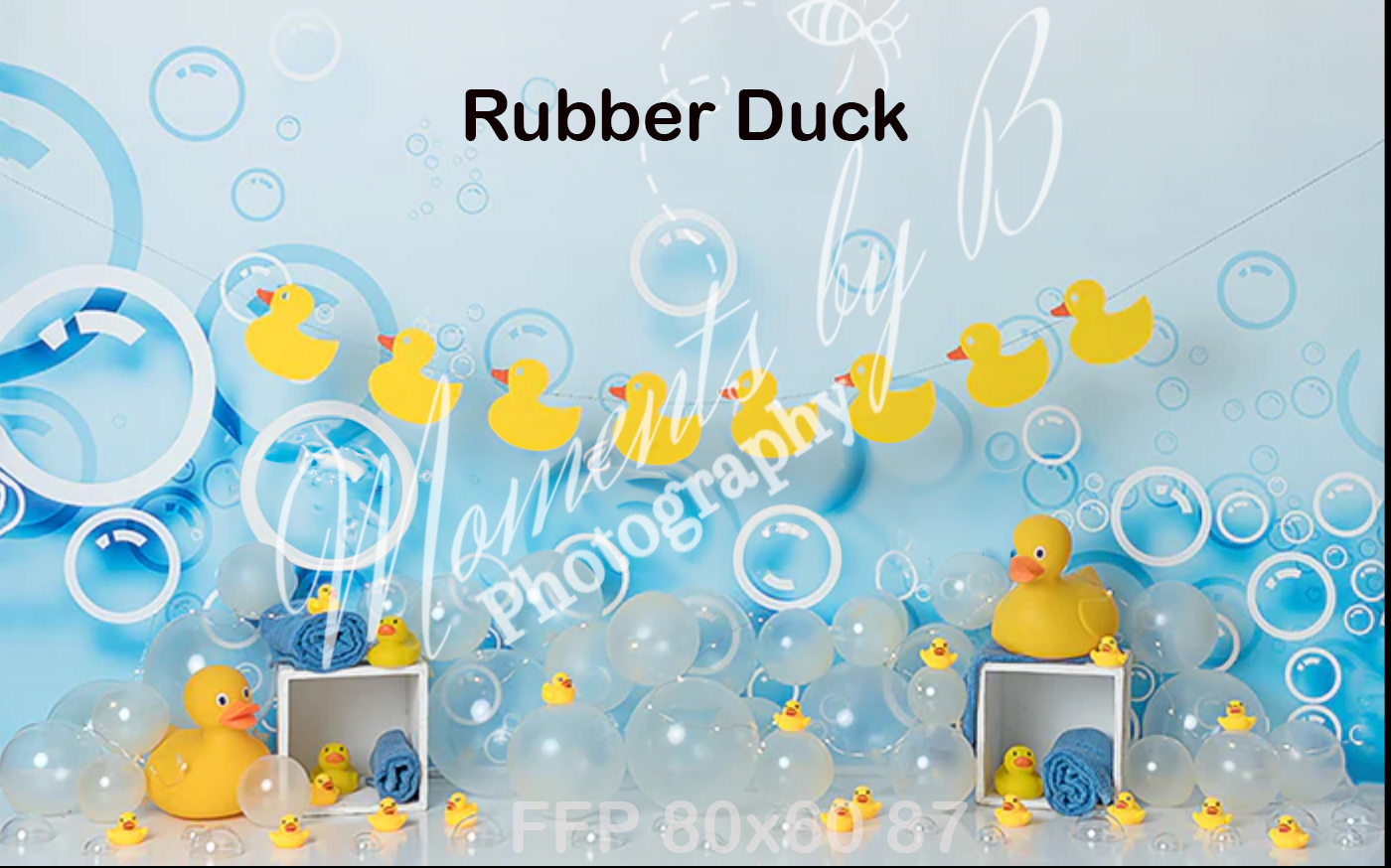 Whimsical rubber duck themed backdrop with yellow ducks and blue bubbles on light background.