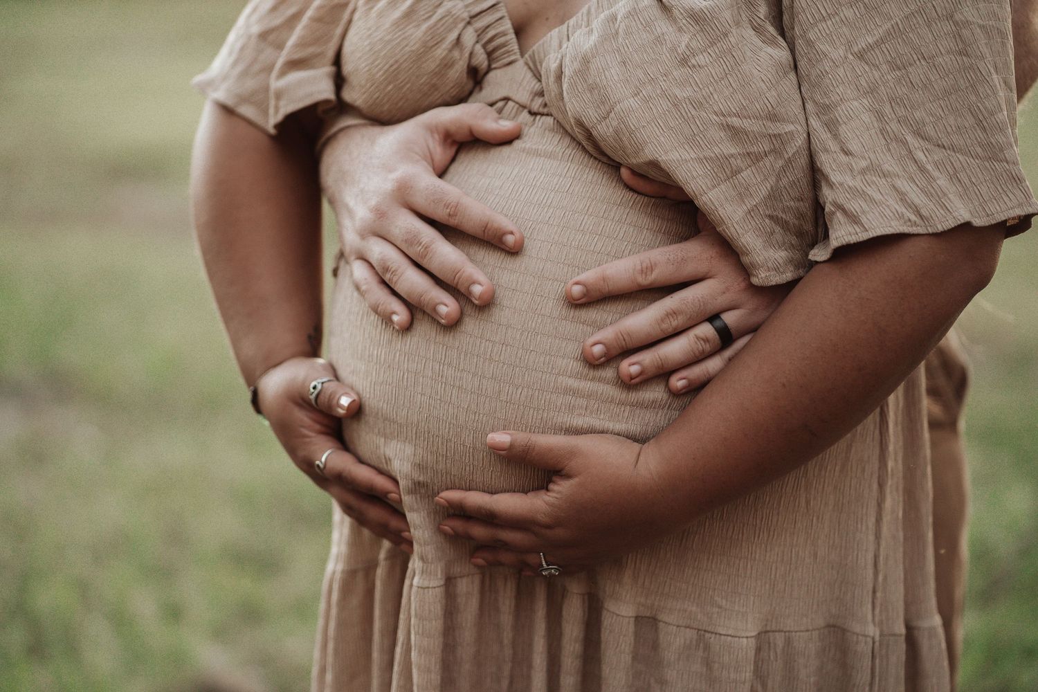A series of maternity photos showing a pregnant belly in a beige dress against a natural outdoor background.