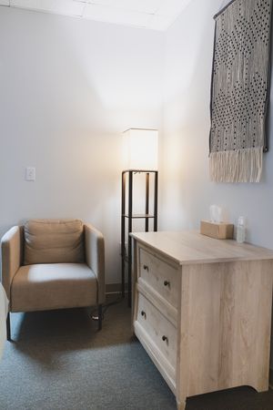 Maple Valley, Acupuncture, WA interior branding of client treatment room of client intake sitting chair